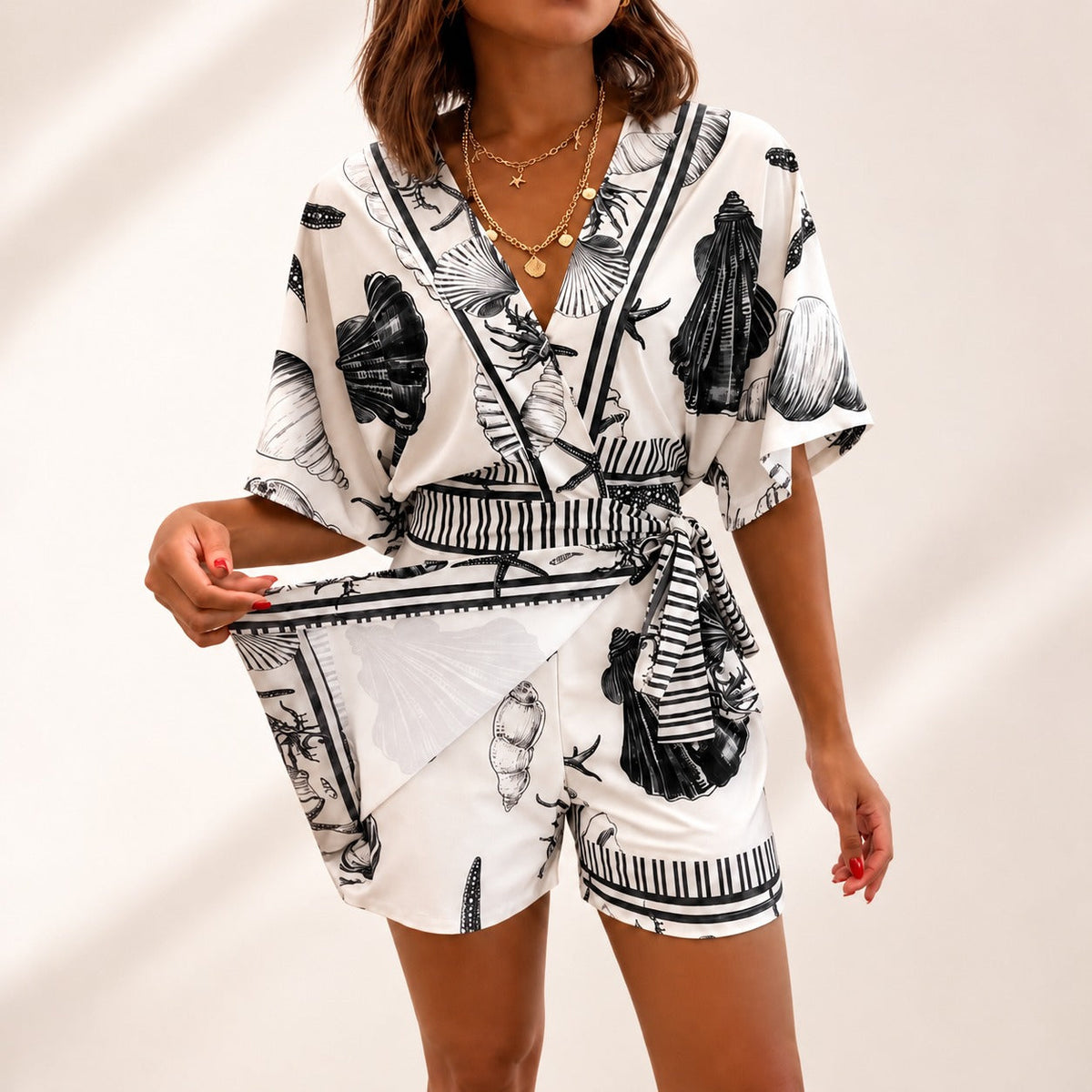 Azzurine™ Skort-Jumpsuit Mit Wickeloptik, Seitlicher Bindung Und Exklusivem Mediterranem Print