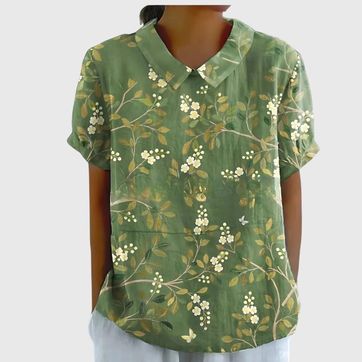 Kurzärmelige Damenbluse mit Blumenmuster und Bubikragen