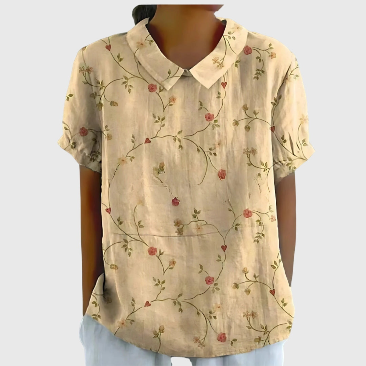 Kurzärmelige Damenbluse mit Blumenmuster und Bubikragen